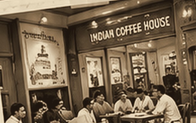 Sepia photograph of guests at an Indian coffee house
